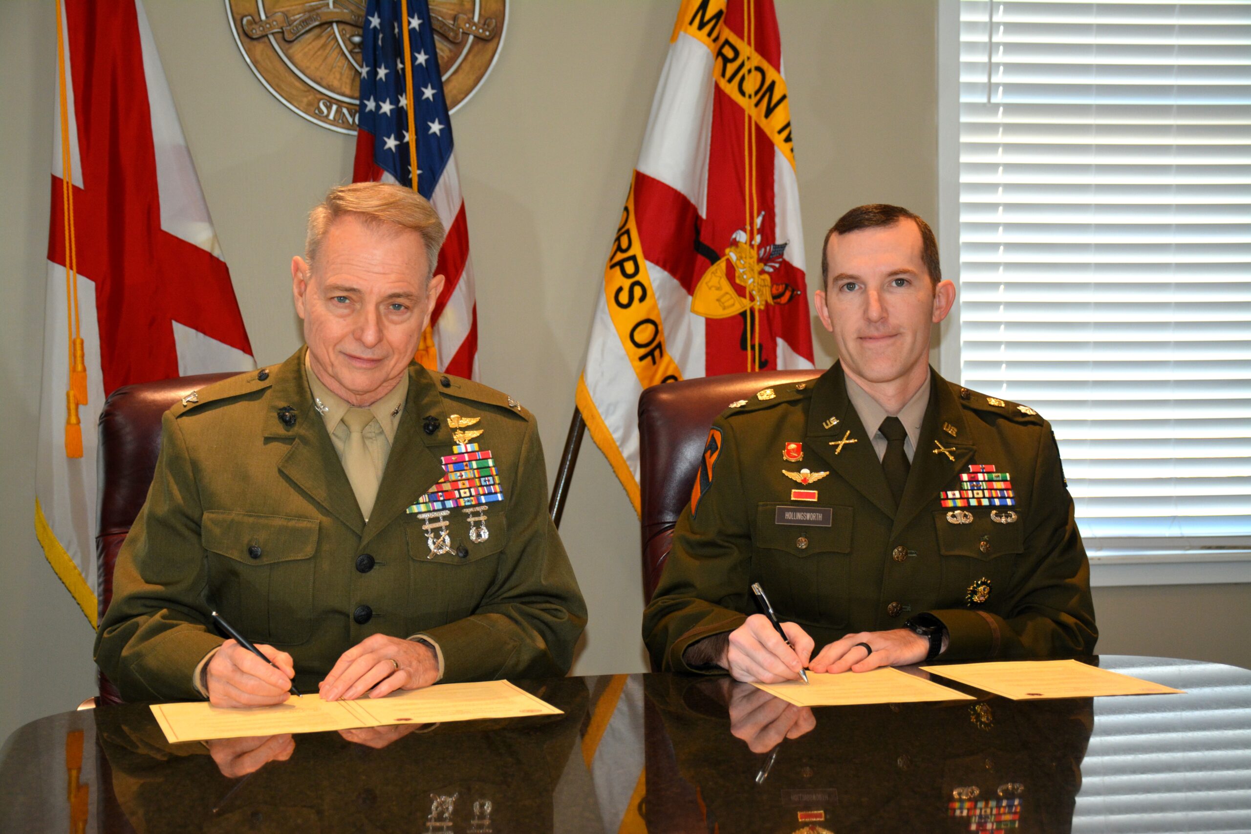 Colonel Mollahan and Lieutenant Colonel Hollingsworth sign the Patriot Pipeline agreement between MMI and MMI Army ROTC