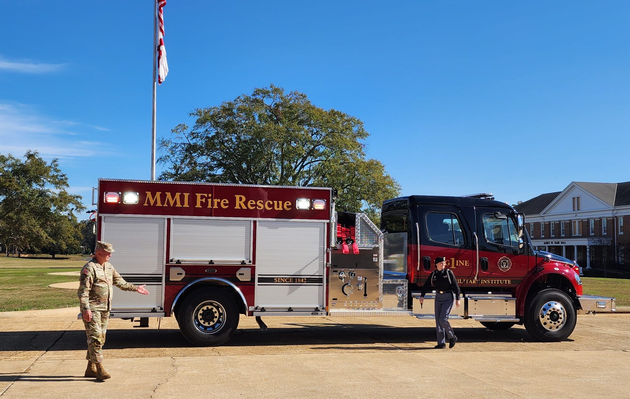 MMI's firetruck on the quad with commandant and female cadet